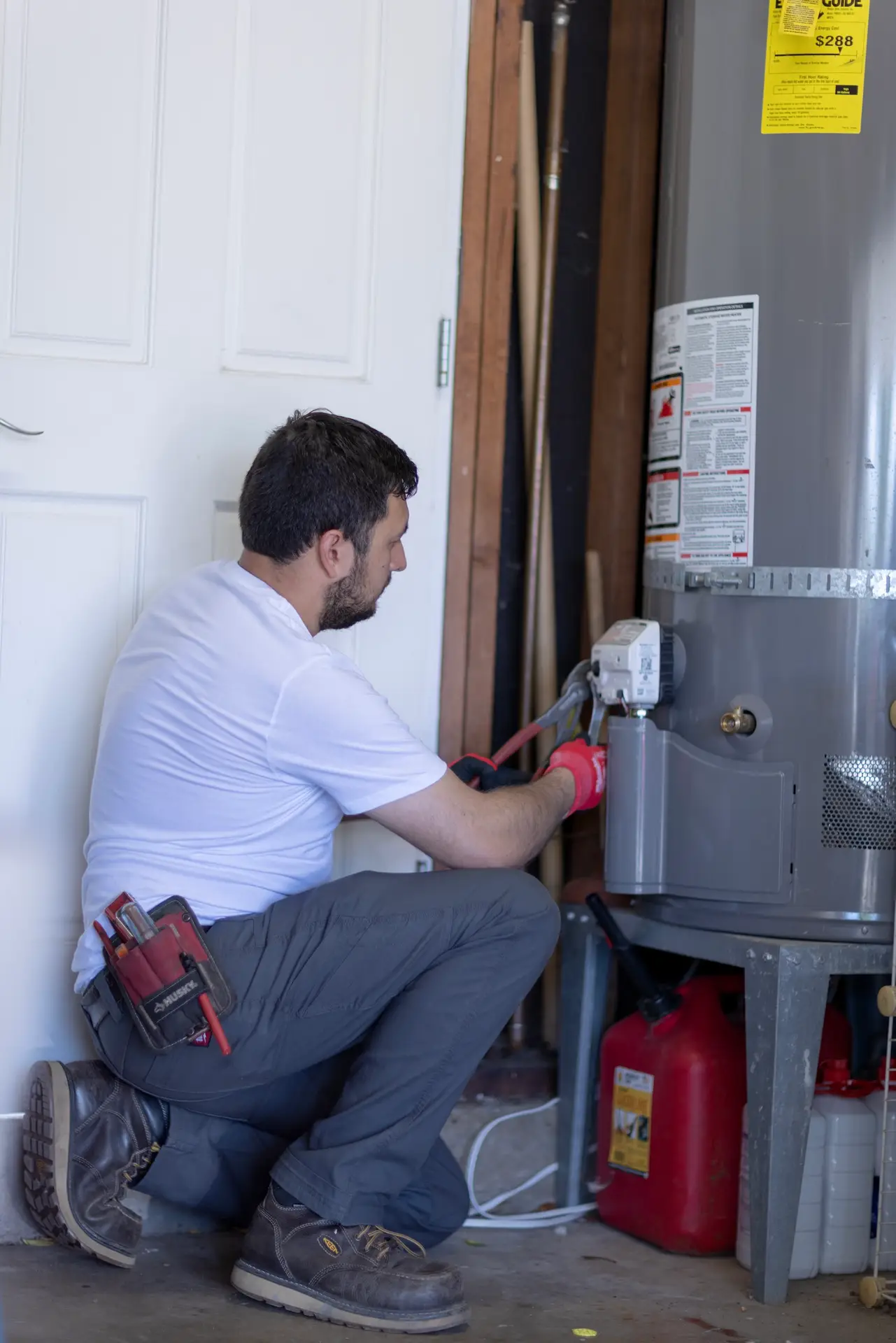 Stan Flow Plumbing repairing a water heater